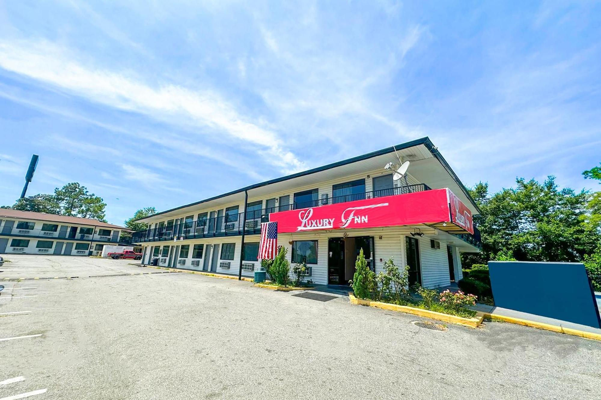 Luxury Inn By Oyo Albany Exterior foto